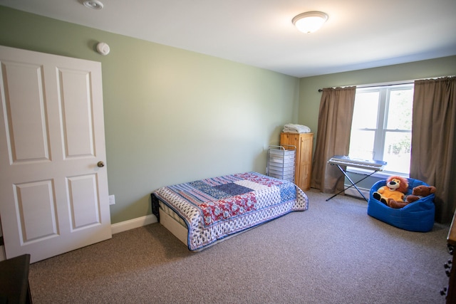 bedroom featuring carpet