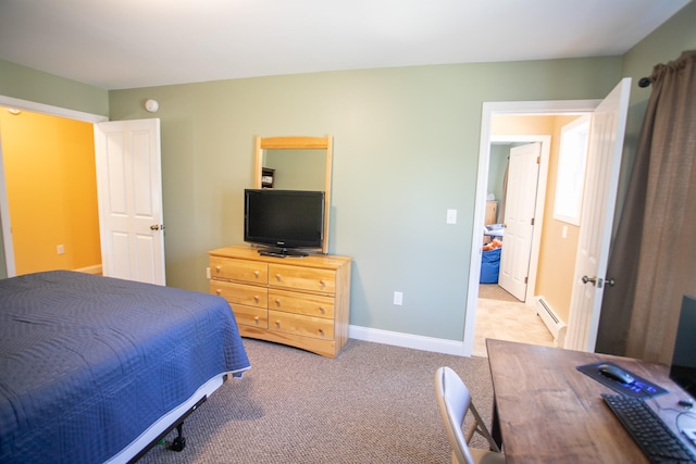 carpeted bedroom with baseboard heating