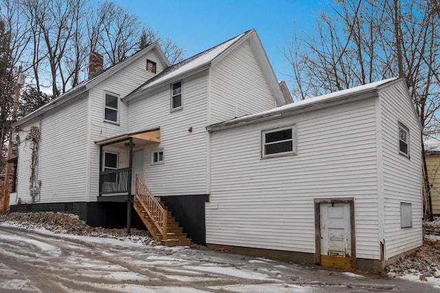 view of snow covered property