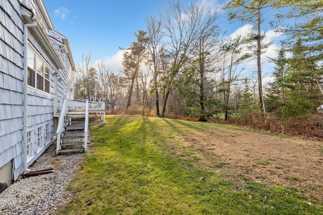 view of yard with a deck