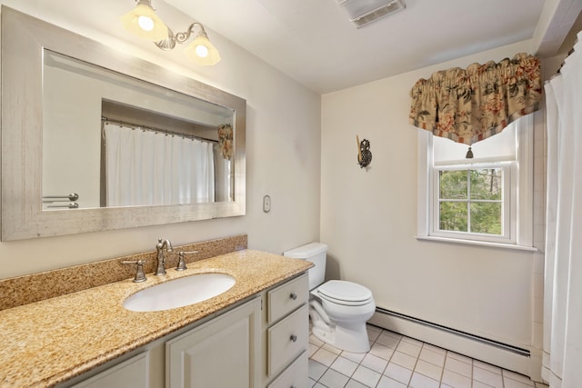 bathroom with tile patterned flooring, vanity, a baseboard radiator, and toilet