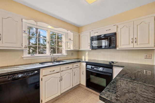 kitchen featuring white cabinetry, sink, light tile patterned flooring, and black appliances