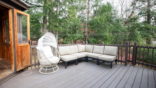 wooden deck with an outdoor hangout area