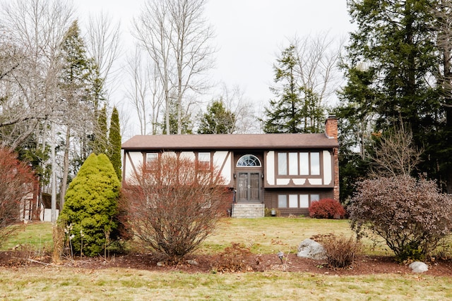 view of front of home with a front yard