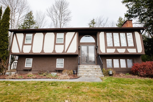 view of front of home with a front lawn