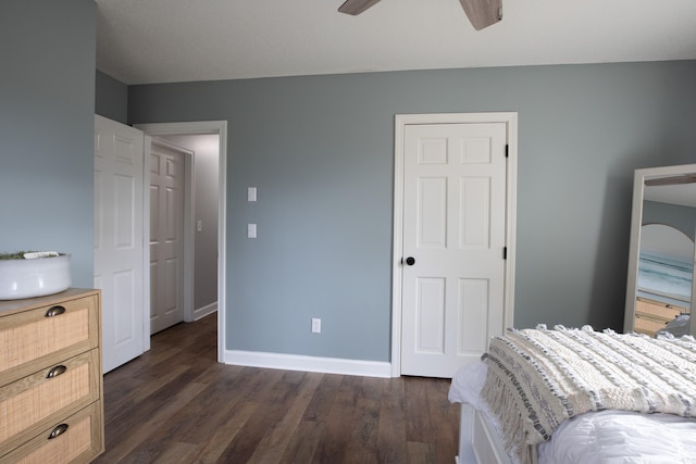 bedroom featuring ceiling fan and dark hardwood / wood-style flooring