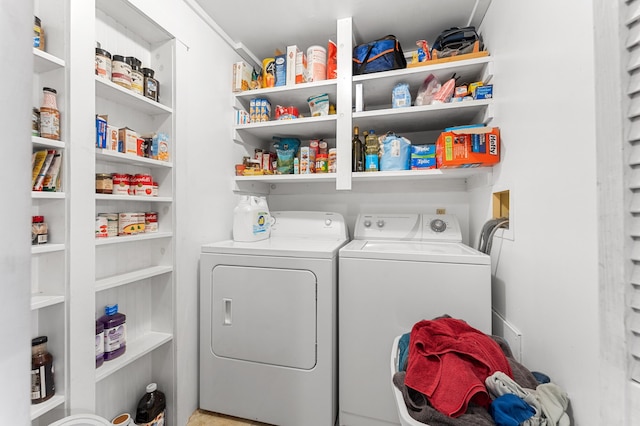 laundry room with washing machine and dryer