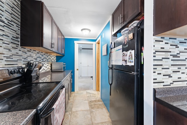 kitchen with dark brown cabinetry, tasteful backsplash, and black appliances