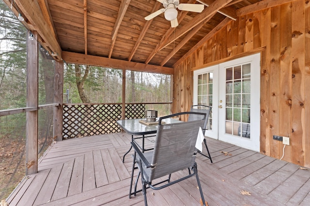 wooden terrace featuring ceiling fan and french doors