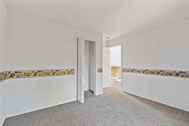 unfurnished bedroom featuring carpet floors