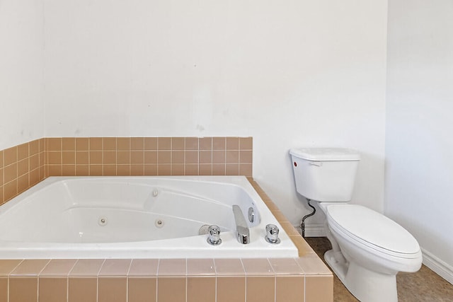 bathroom with tiled bath and toilet