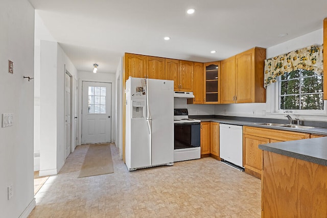 kitchen featuring sink and white appliances