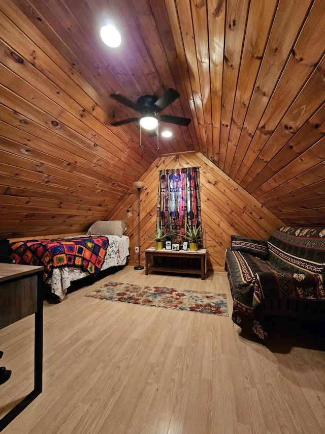 unfurnished bedroom with wood walls, wooden ceiling, vaulted ceiling, and hardwood / wood-style flooring