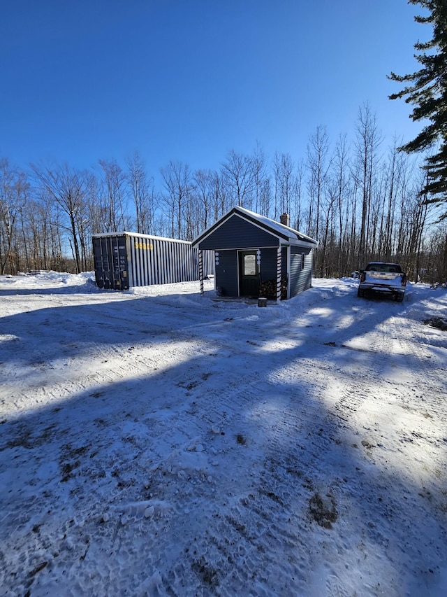 view of snow covered property