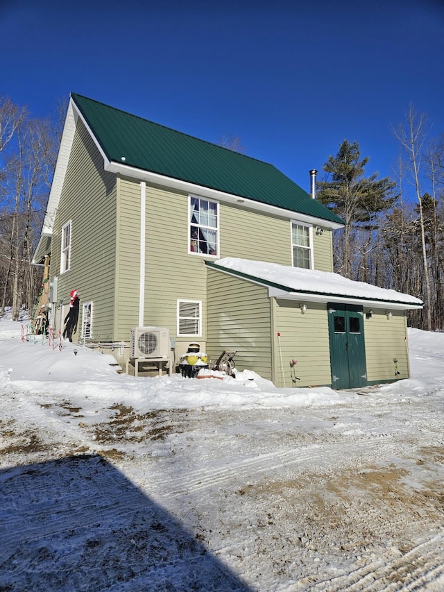 view of snow covered property