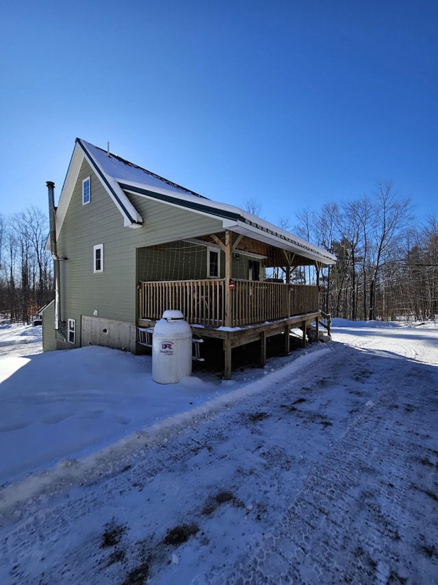 exterior space with a wooden deck