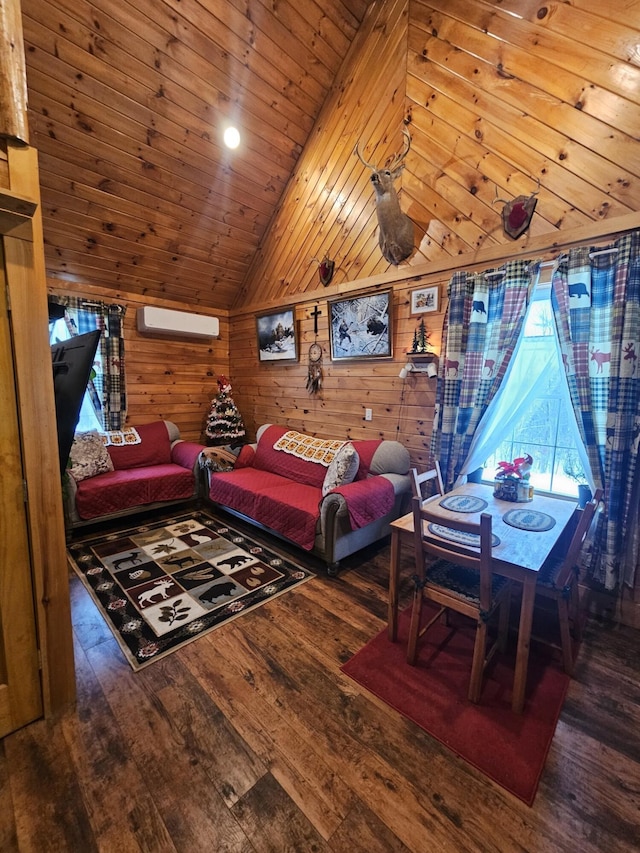 living room with hardwood / wood-style flooring, an AC wall unit, lofted ceiling, and wood walls