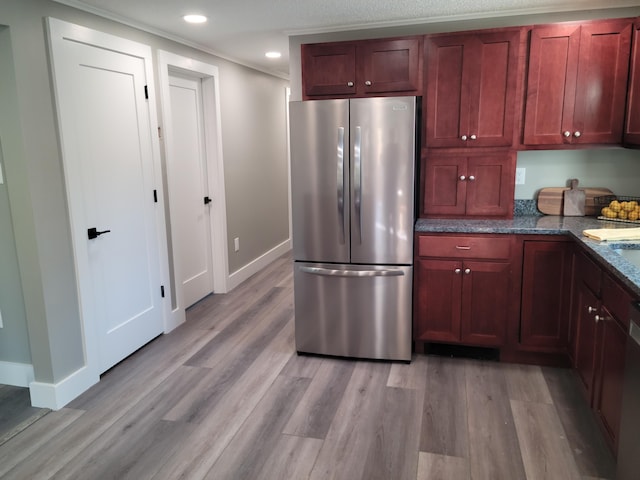 2 Old County Rd, Veazie, ME 04401 - kitchen featuring freestanding refrigerator, light wood finished floors, baseboards, and recessed lighting