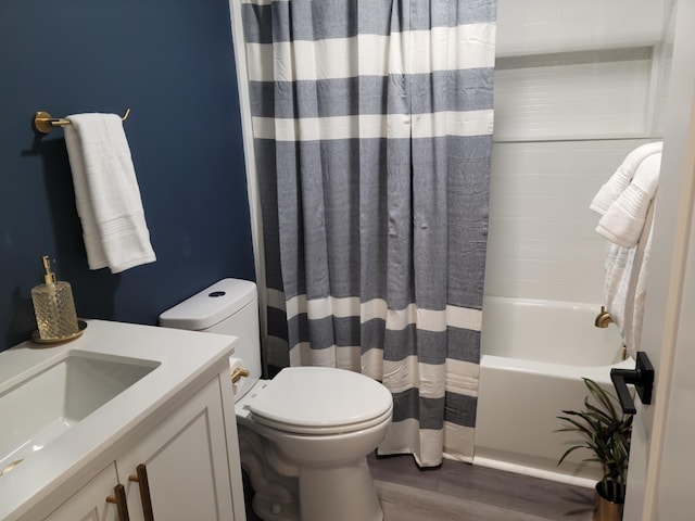2 Old County Rd, Veazie, ME 04401 - bathroom featuring wood finished floors, toilet, vanity, and shower / tub combo