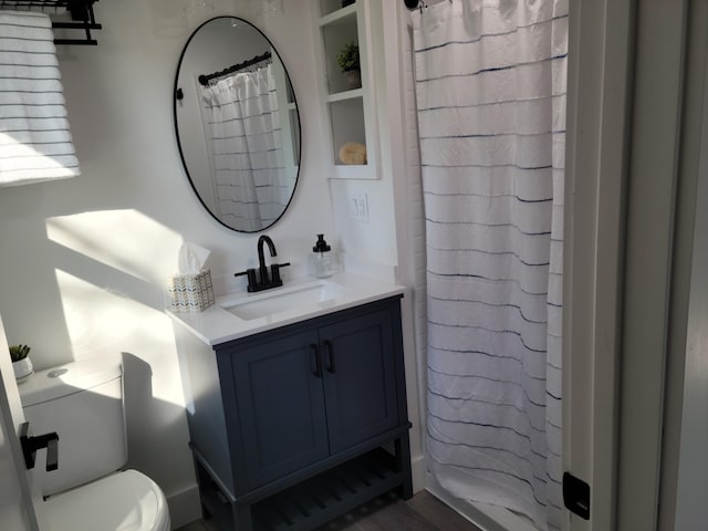 2 Old County Rd, Veazie, ME 04401 - full bathroom featuring vanity, toilet, and a shower with curtain