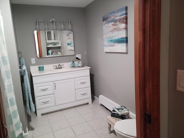 2 Old County Rd, Veazie, ME 04401 - full bathroom featuring toilet, baseboard heating, vanity, and tile patterned floors