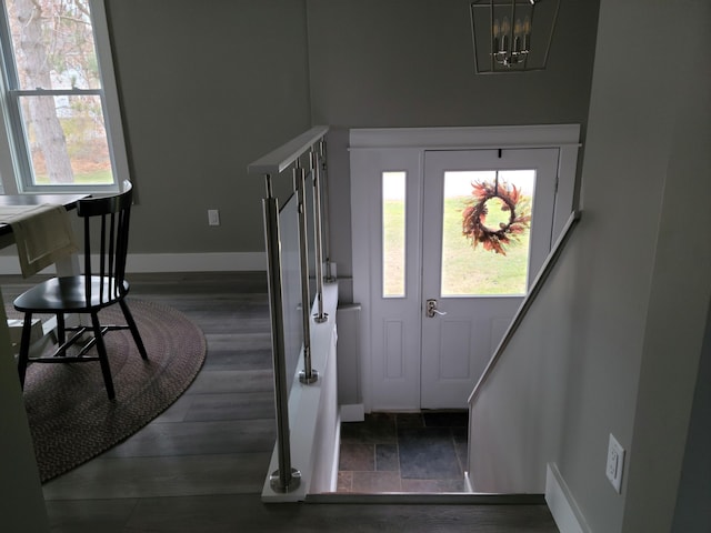 2 Old County Rd, Veazie, ME 04401 - foyer featuring baseboards and a chandelier