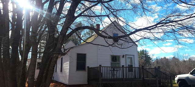 exterior space with a wooden deck