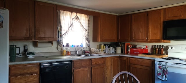 kitchen featuring sink and black appliances