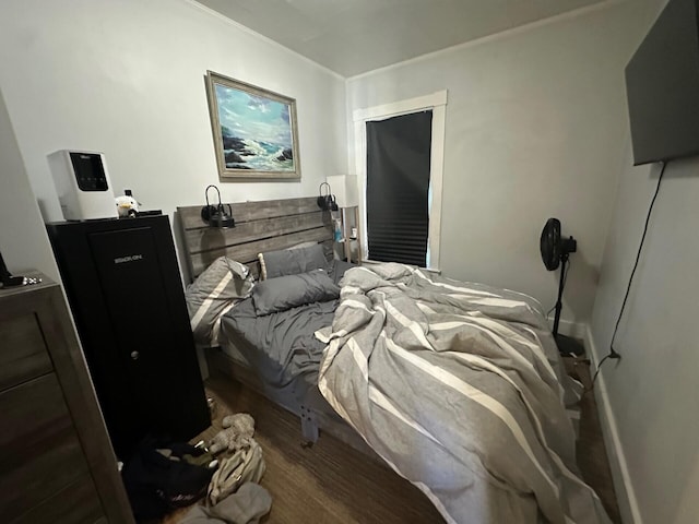 bedroom featuring hardwood / wood-style flooring