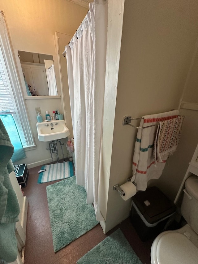 bathroom with toilet and sink