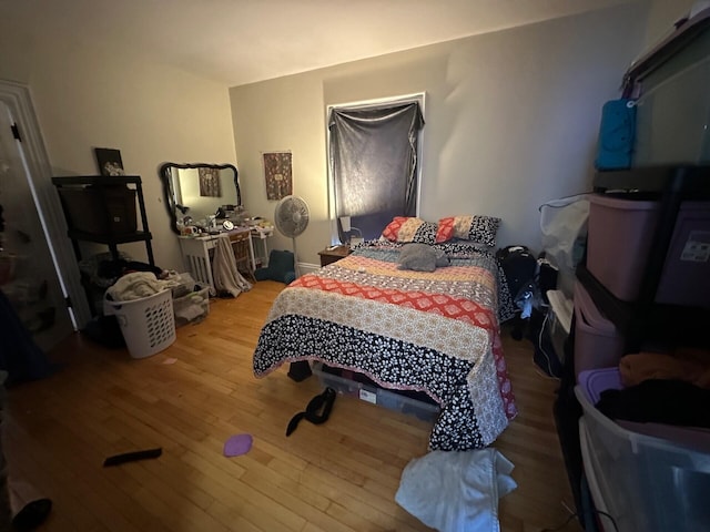 bedroom featuring hardwood / wood-style floors