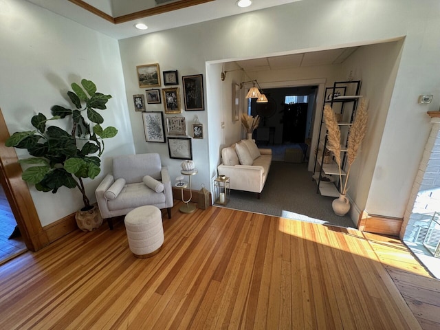 sitting room with hardwood / wood-style floors