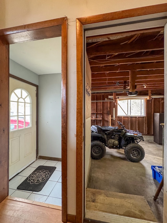 interior space featuring light tile patterned floors and a wealth of natural light