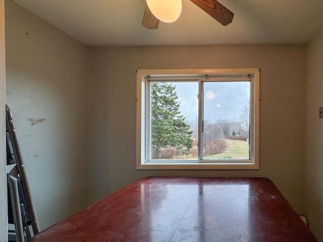 spare room featuring ceiling fan