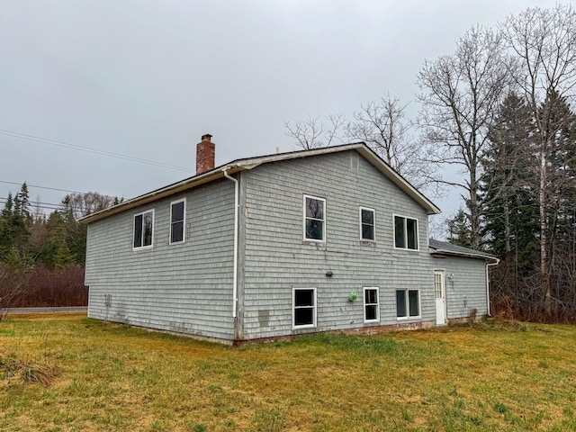 view of property exterior featuring a yard