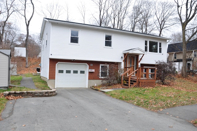 split foyer home featuring a garage