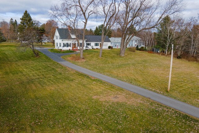 544 Main Rd N, Hampden, ME 04444 - view of green lawn with driveway