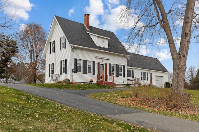 544 Main Rd N, Hampden, ME 04444 - view of front of property with a chimney, an attached garage, roof with shingles, and a front yard