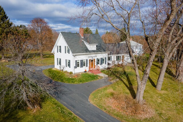 544 Main Rd N, Hampden, ME 04444 - cape cod house with a chimney, driveway, and a front yard