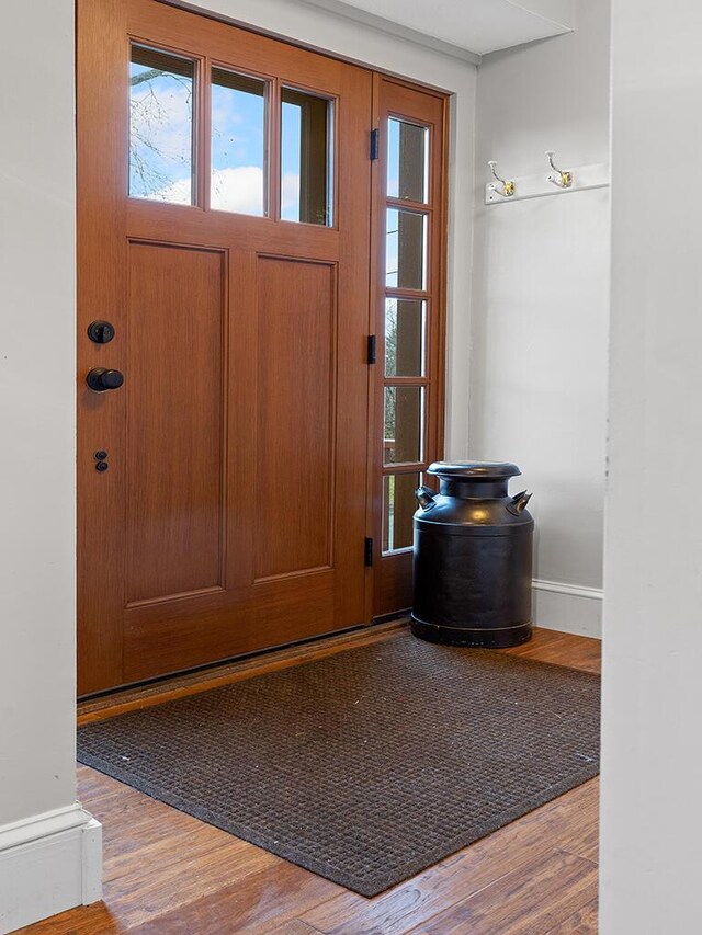 544 Main Rd N, Hampden, ME 04444 - entryway with wood finished floors and baseboards