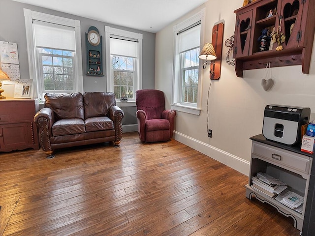 544 Main Rd N, Hampden, ME 04444 - living room featuring hardwood / wood-style flooring and baseboards