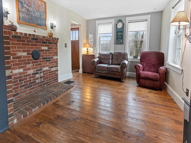 544 Main Rd N, Hampden, ME 04444 - living room with hardwood / wood-style flooring and baseboards