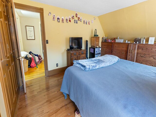 544 Main Rd N, Hampden, ME 04444 - bedroom with wood finished floors and baseboards
