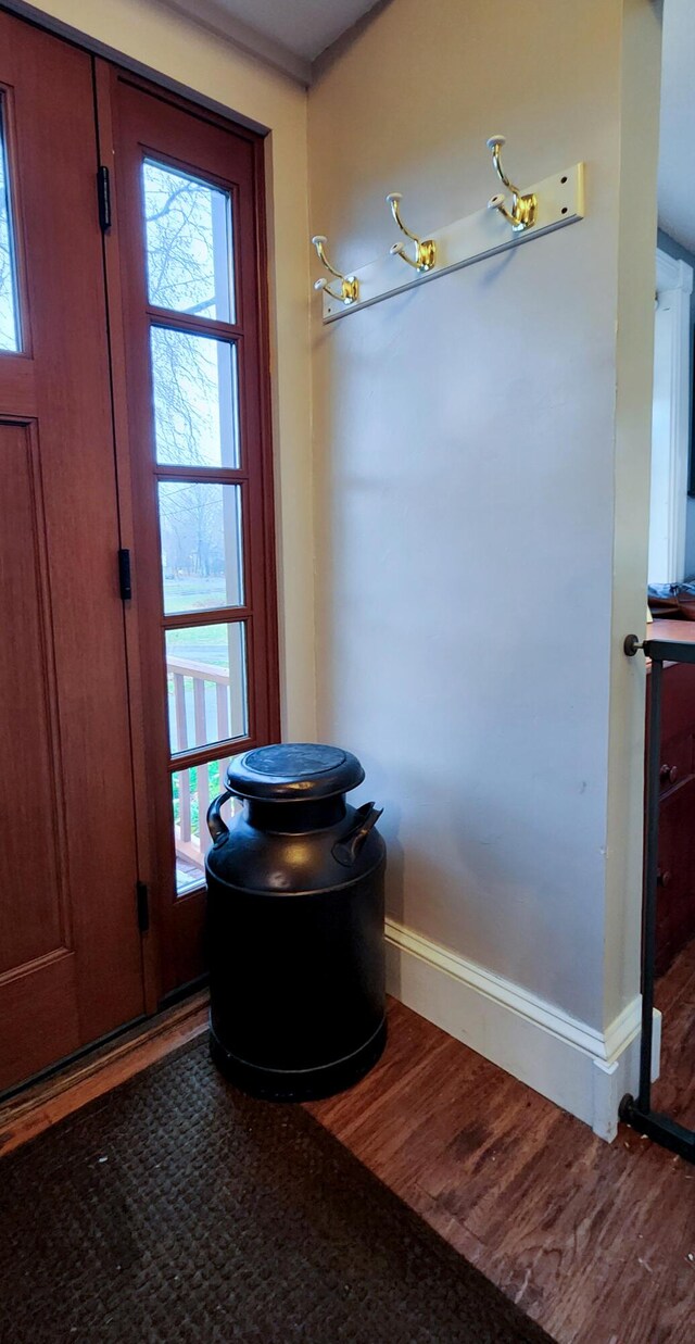 544 Main Rd N, Hampden, ME 04444 - bathroom featuring wood finished floors, plenty of natural light, and baseboards
