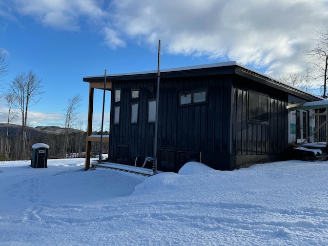 view of snow covered property