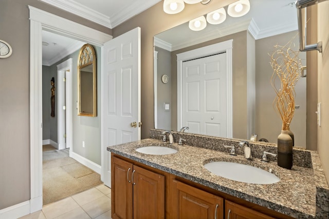 bathroom featuring tile patterned flooring, vanity, and ornamental molding