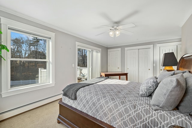 bedroom featuring carpet, a baseboard radiator, ceiling fan, and ornamental molding