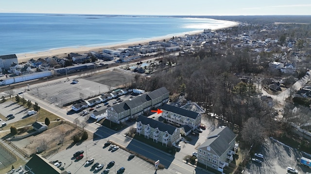 aerial view featuring a water view and a view of the beach