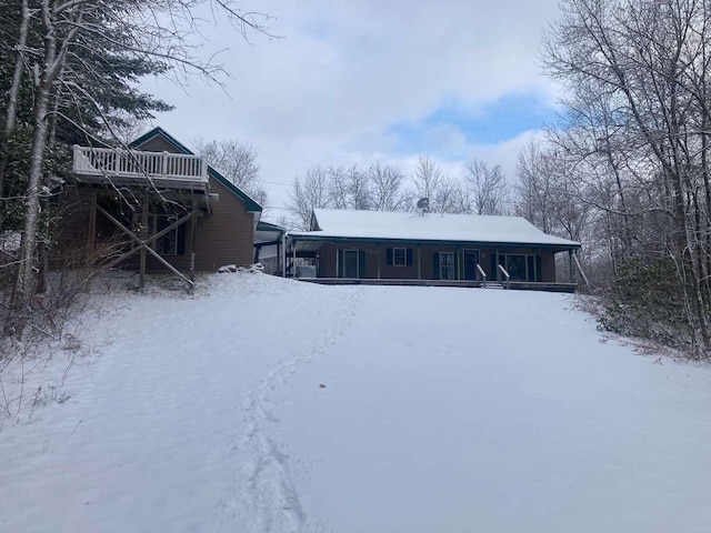 view of snow covered property