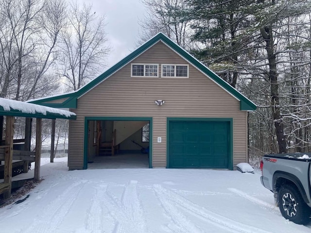 view of snow covered garage